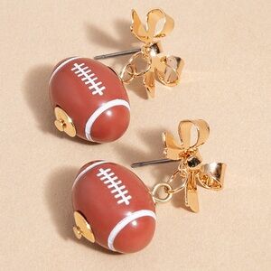 NWT Francesca’s Bow Football Drop Earrings